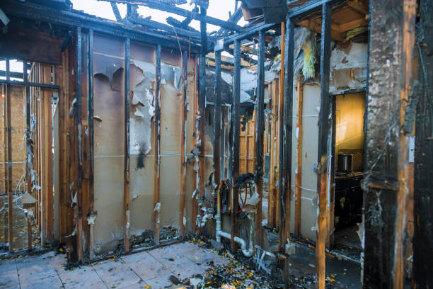 Professional Fire Damage Restoration technician working in Fort Myers Beach, FL